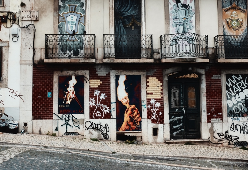 Graffiti covered abandoned buildings add to the grittiness of Lisbon streets Graffiti covered abandoned buildings add to the grittiness of Lisbon streets