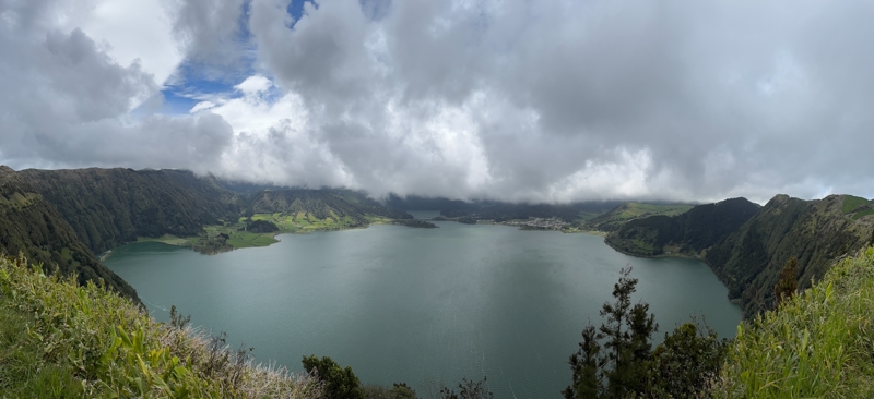 A view of the lake-filled crater with Sete Cidades in the distance A view of the lake-filled crater with Sete Cidades in the distance