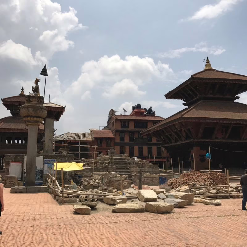 Bhaktapur temple damage Many of the stone buildings in Bhaktapur (City of Devotees) suffered damage from the 2015 earthquake and are being rebuilt. The wooden buildings fared much better due to their ability to move with the tremors.